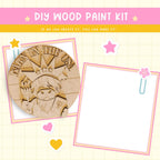 a wooden craft kit with a picture of a woman's face