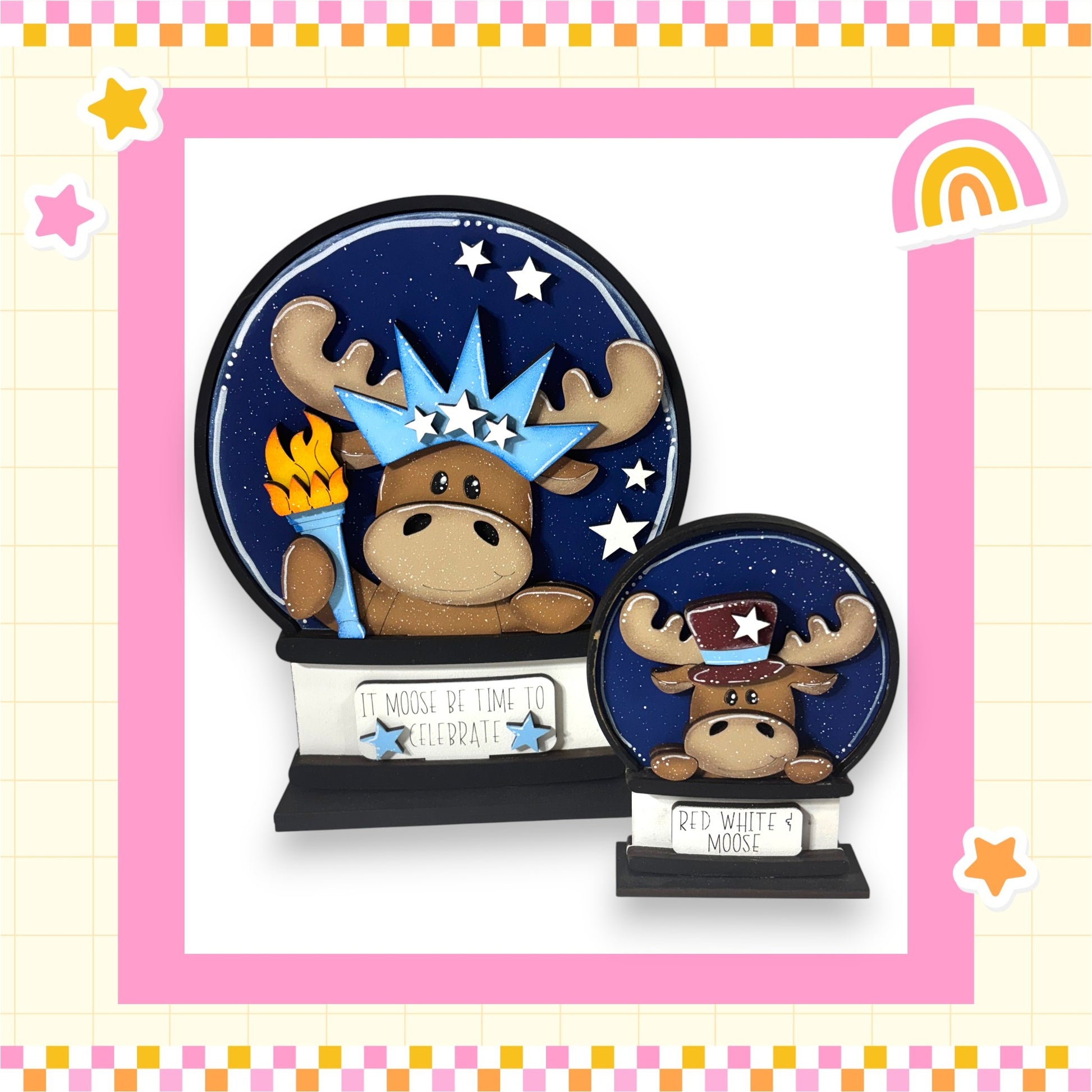 A snow globe featuring a moose wearing a hat and holding a torch, surrounded by stars and a rainbow.