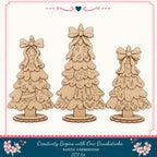 three wooden Christmas tree ornaments with bows, arranged in a row against a white background.