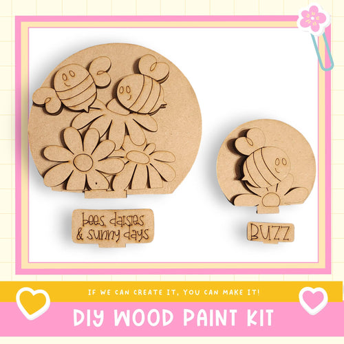 The image is a DIY wood paint kit featuring a wooden bee and flower decoration.