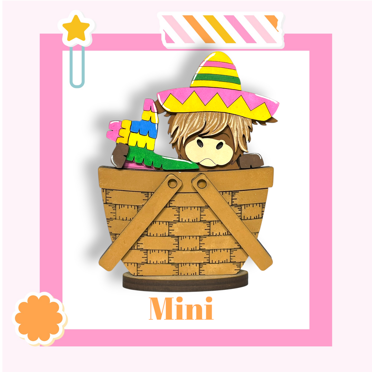 A wooden basket with a toy donkey inside, wearing a colorful sombrero.