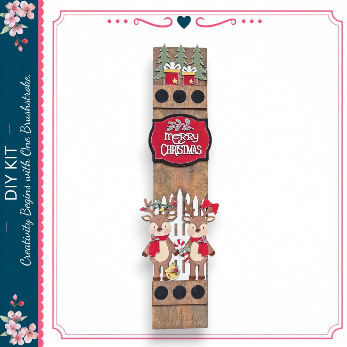 A wooden Christmas decoration with two reindeer and a "Merry Christmas" sign.