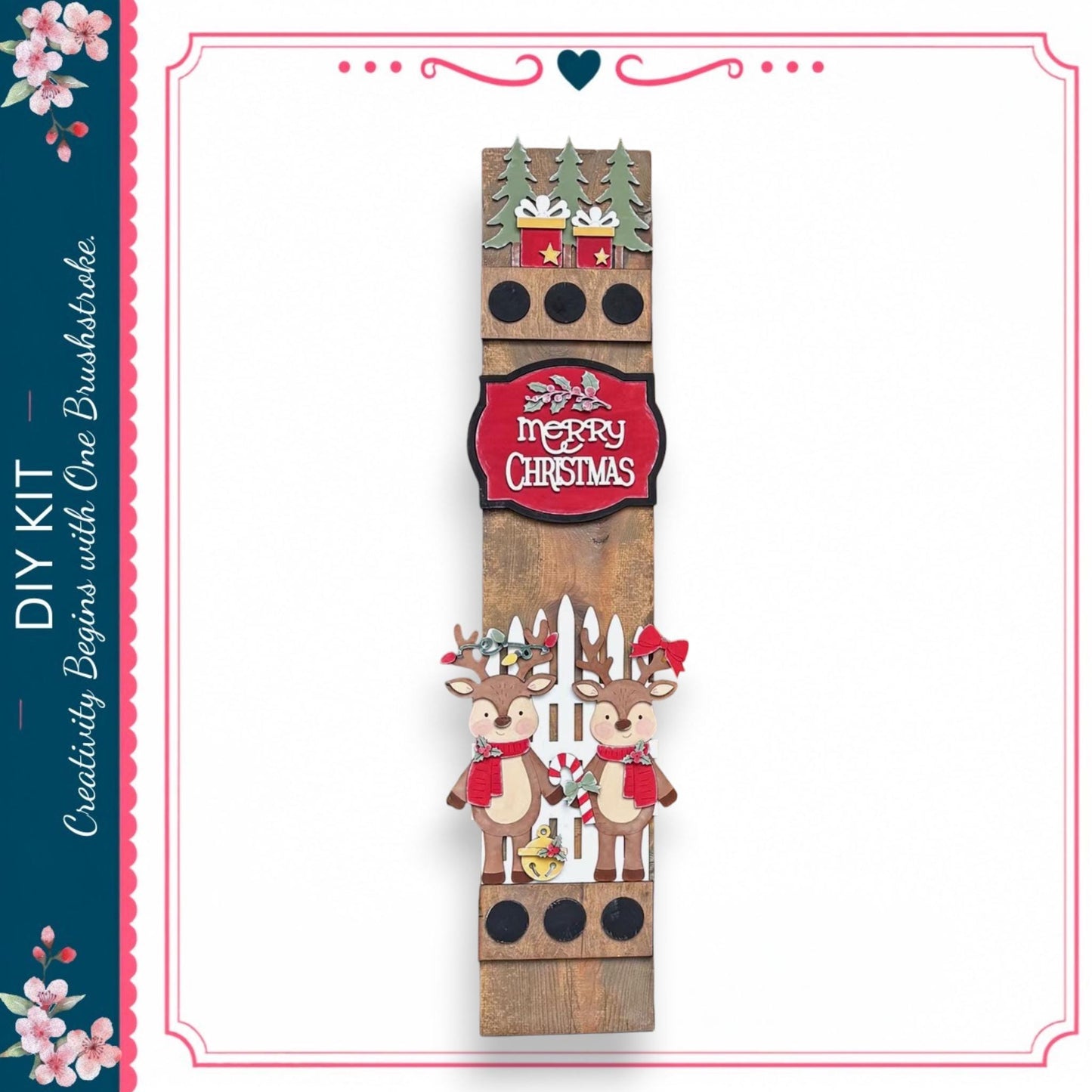 A wooden Christmas decoration with two reindeer and a "Merry Christmas" sign.