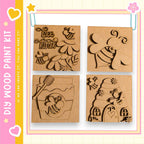 four wooden paint kits, each featuring a different design related to bees and honey. The kits include a honeycomb, a bee hive, a honey jar, and a bee-themed house.