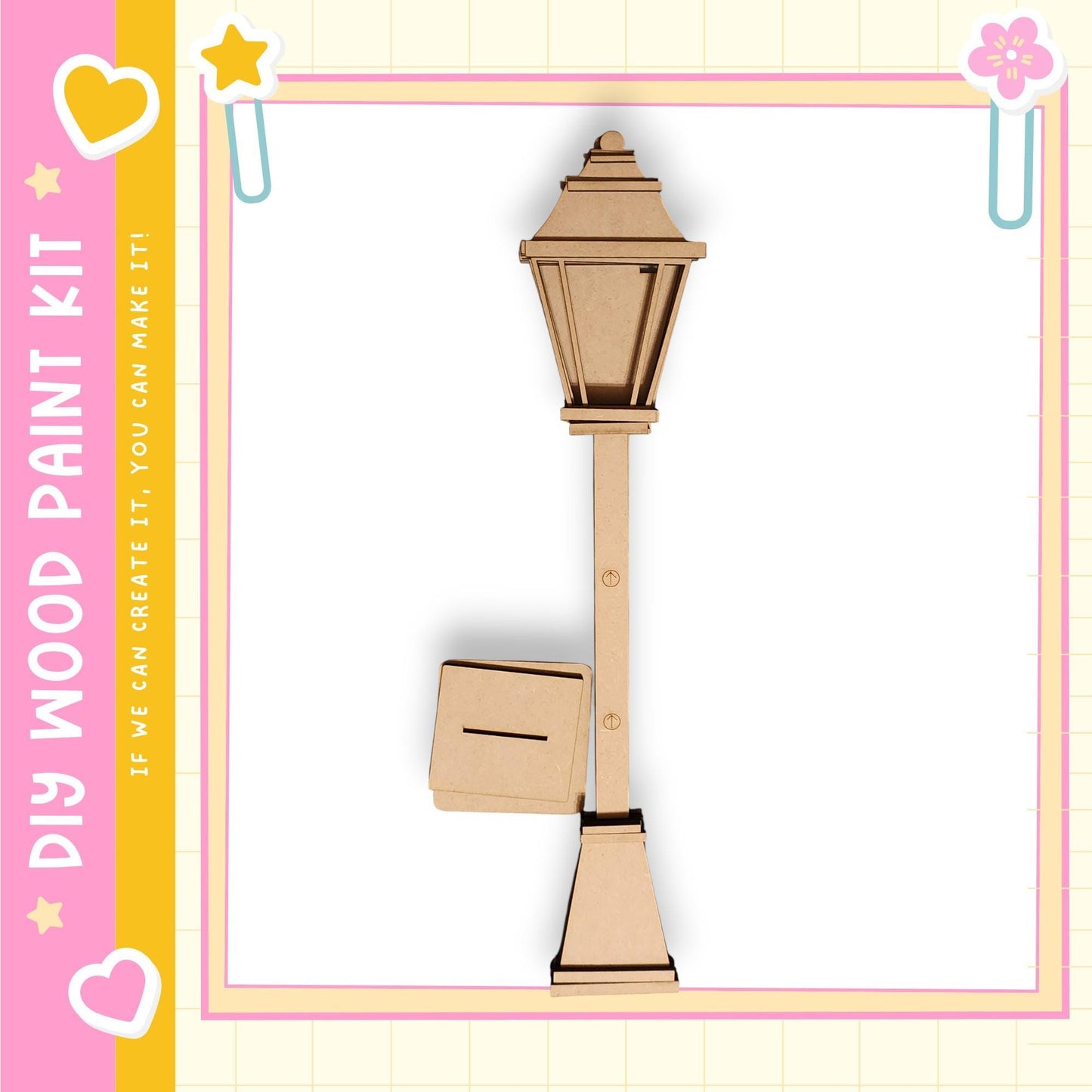 A wooden post with a light fixture attached to it, set against a pink and yellow background with decorative elements.