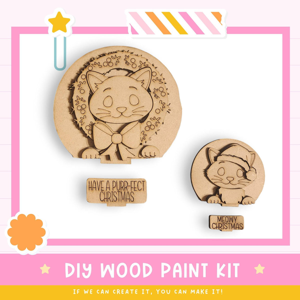 a DIY wood paint kit for creating wooden decorations, including two wooden cat-shaped ornaments. The kit includes a label that says "Have a purrfect Christmas" and a smaller label that says "Meowy Christmas". The kit is presented in a pink and white color scheme, with a star decoration on the left side.
