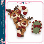 a festive scene with two wooden reindeer and a candy cane, all adorned with bows and red and white striped patterns.