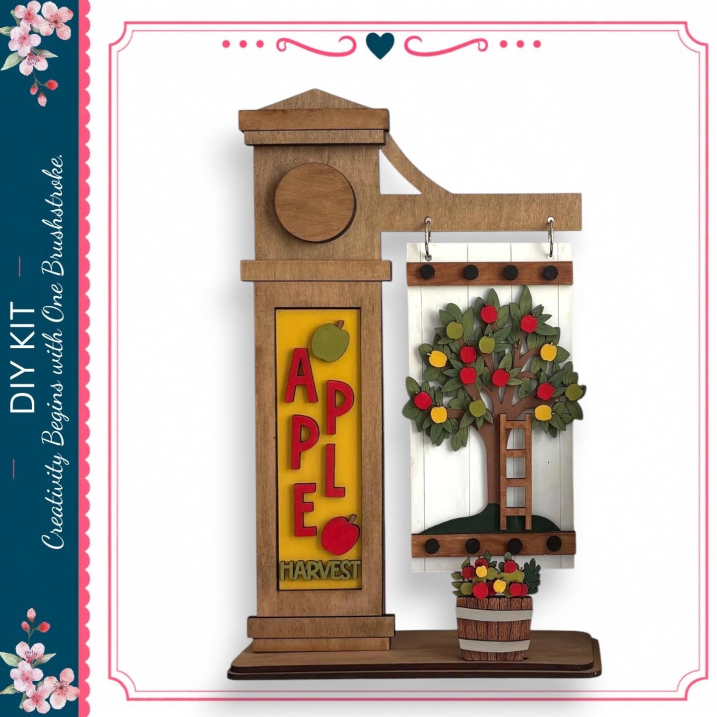 a wooden apple tree decoration with a basket of apples on a shelf.