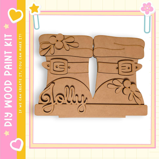 A pair of wooden paint shoes with the word "Jolly" written on them, set against a pink and yellow background with decorative elements.