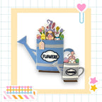 a blue watering can filled with lots of candy