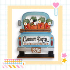 a picture of a truck with carrots in the back