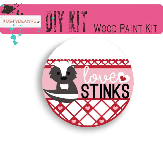 a button with the words love stinks on it