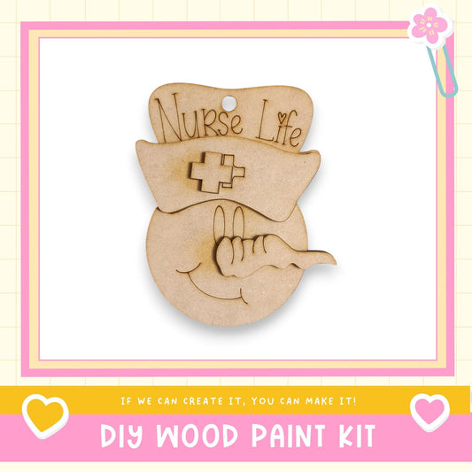 a DIY wood paint kit with a wooden charm in the shape of a nurse's hat and a smiley face.