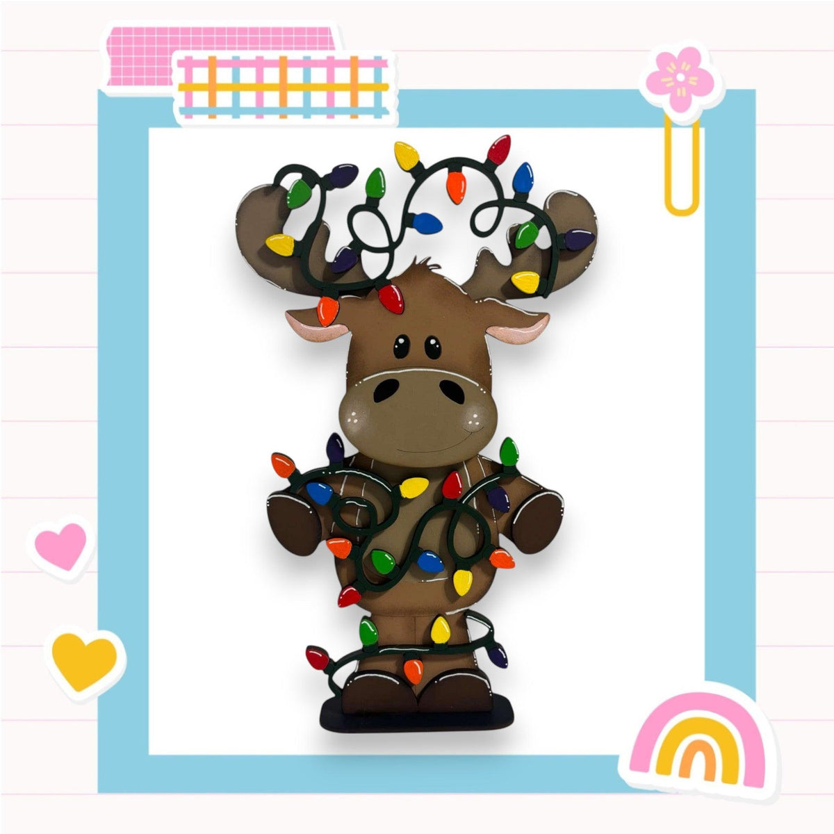 a paper cut out of a moose with christmas lights