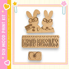 a kit for creating Easter-themed decorations, including a pair of wooden Easter bunny figures and a sign that says "Easter Blessings".