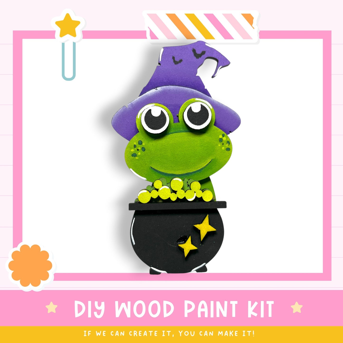 a DIY wood paint kit for creating a whimsical frog-shaped decoration, with a witch's hat and a cauldron.