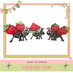 The image is a finished item ready to be displayed, featuring a group of cartoon-like ants carrying strawberries and a watermelon slice.