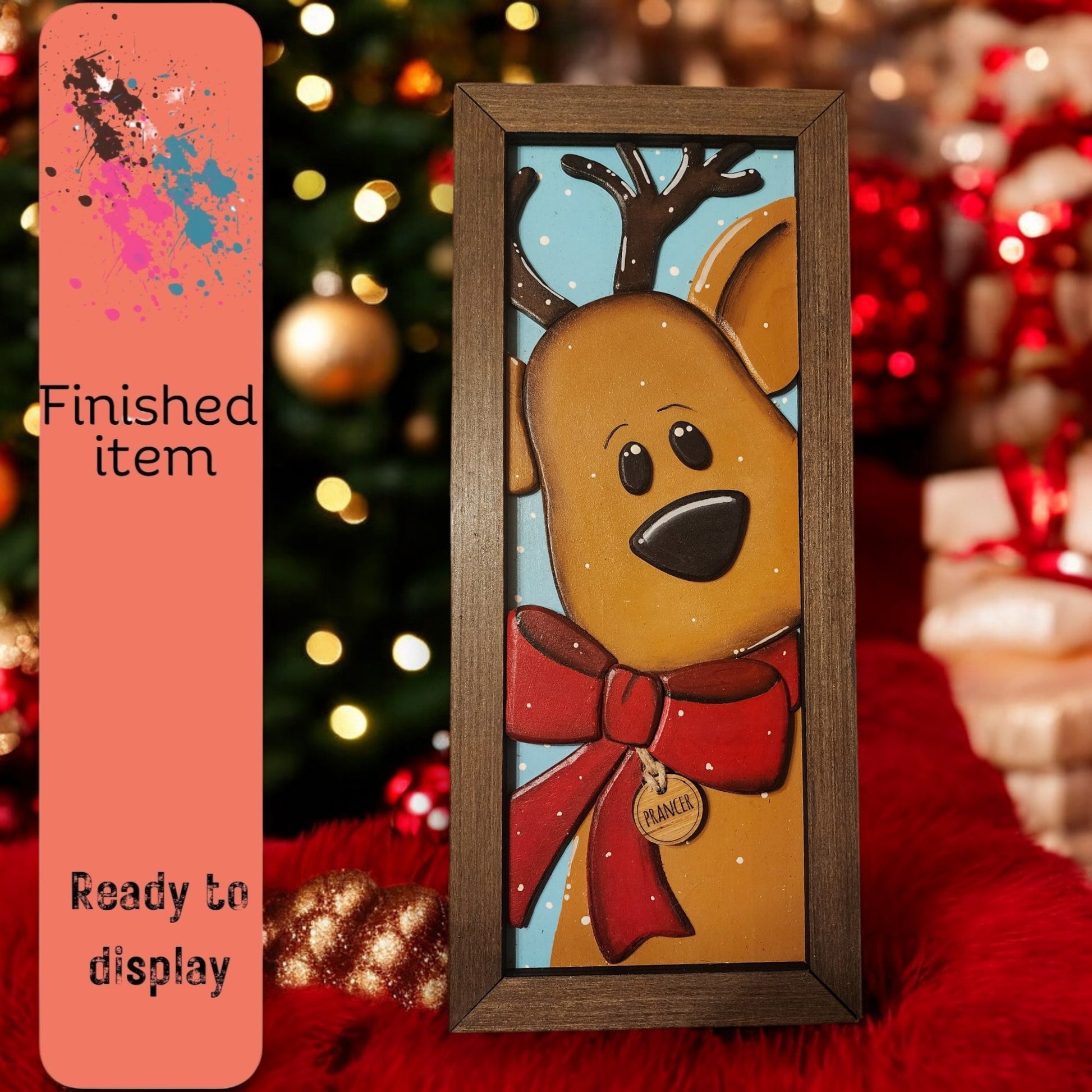 a picture frame with a picture of a reindeer