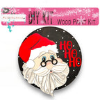 a button with a santa clause on it