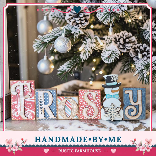 A handmade wooden sign with the word "FROSBY" made of wooden blocks, placed in front of a decorated Christmas tree with ornaments and lights.