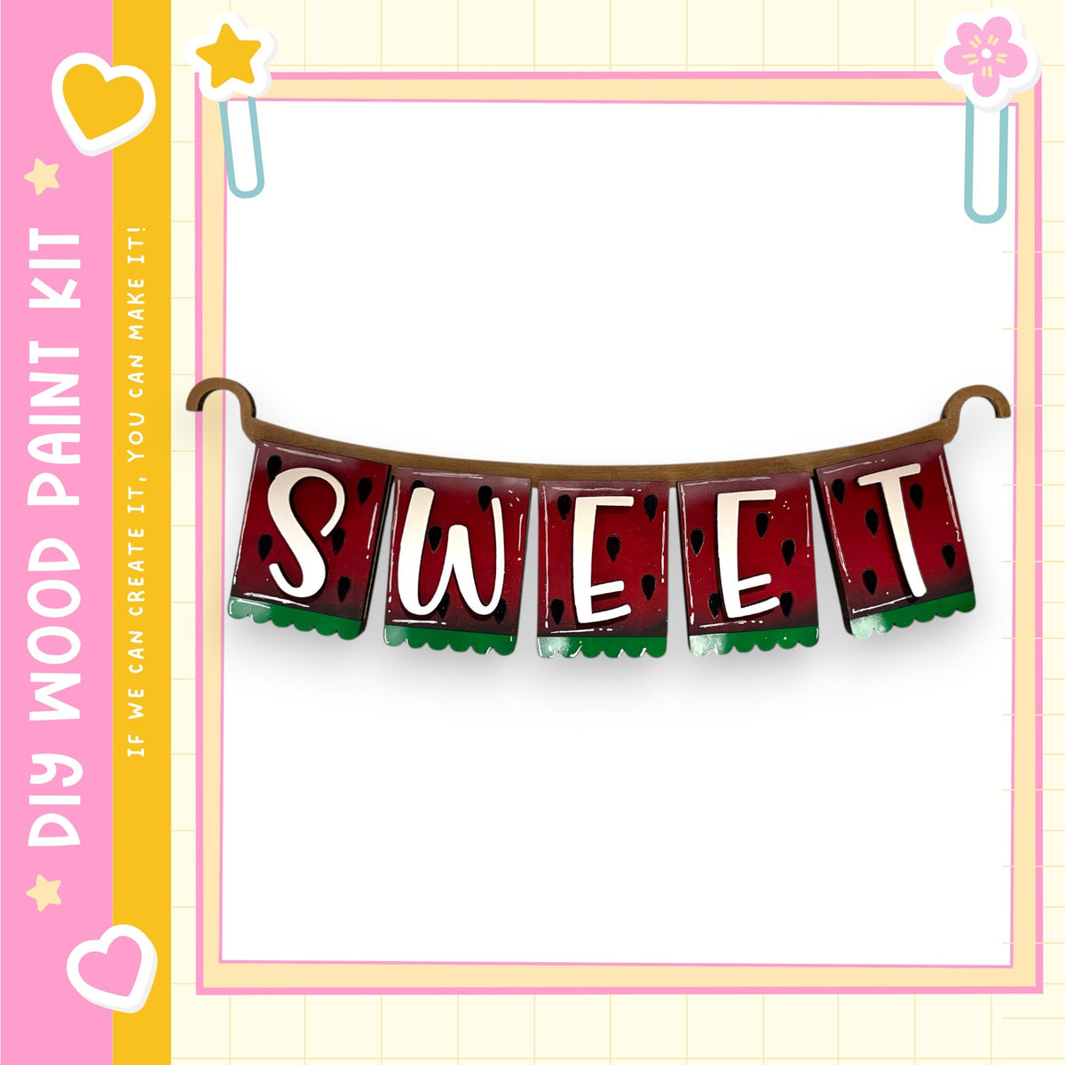 a banner with the word "SWEET" written on it, hanging from a hook. The banner is decorated with watermelon slices and green leaves, giving it a playful and summery appearance.