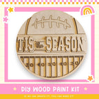 a DIY wood paint kit for creating a football-themed decoration.