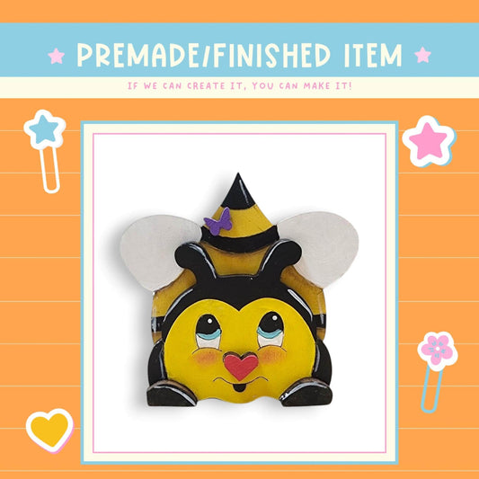 a picture of a bee wearing a hat