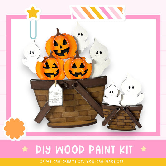 The image is a DIY wood paint kit featuring a basket filled with carved pumpkins and ghostly figures, along with a tag that reads "Just for the kids".