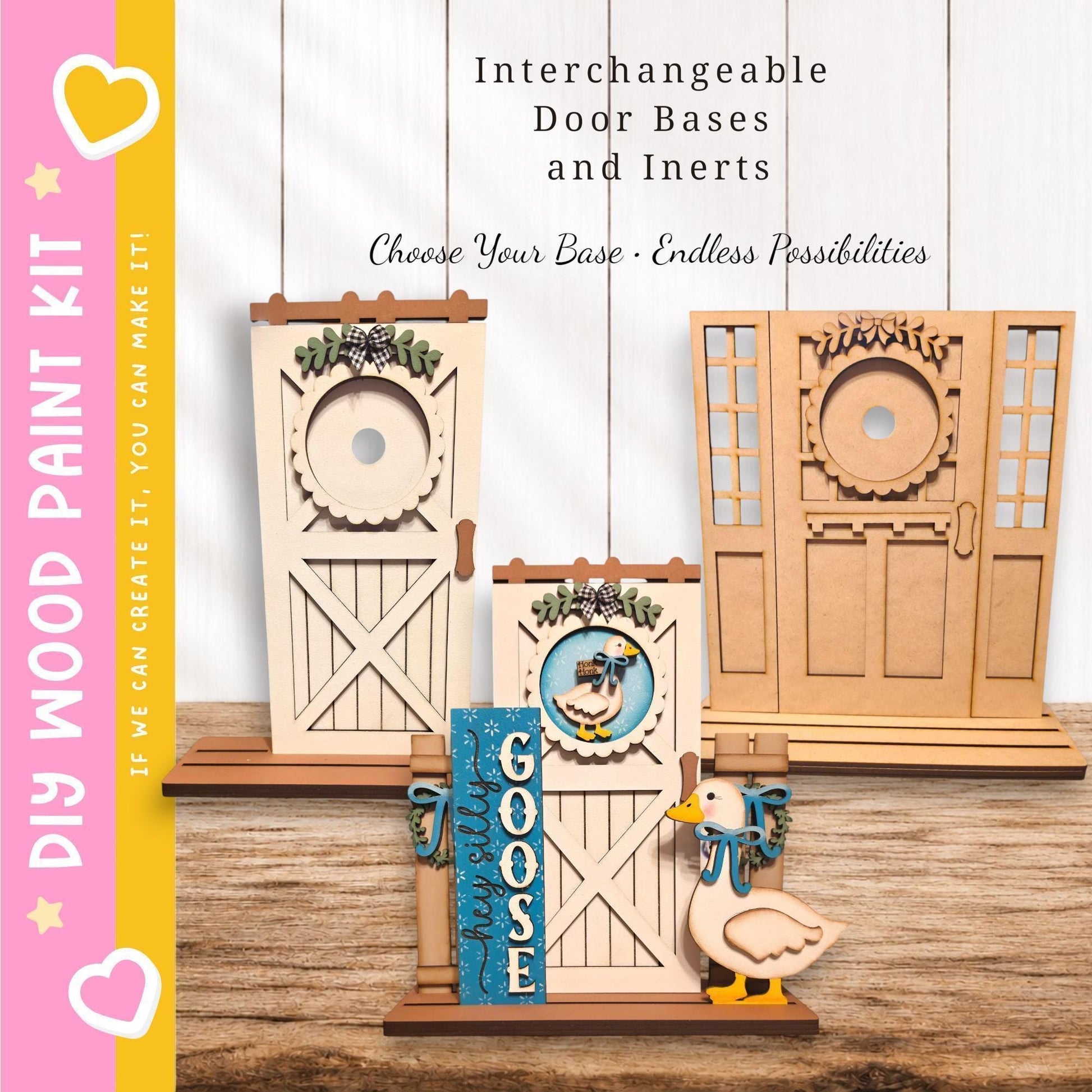 a DIY paint kit for creating door bases and inerts. There are three wooden door bases displayed, each with different designs and decorations. A small wooden bird figurine is also present on the table. The kit appears to be designed for people to customize their door bases and inerts according to their preferences.