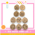 a wooden christmas tree ornament with a happy holiday message