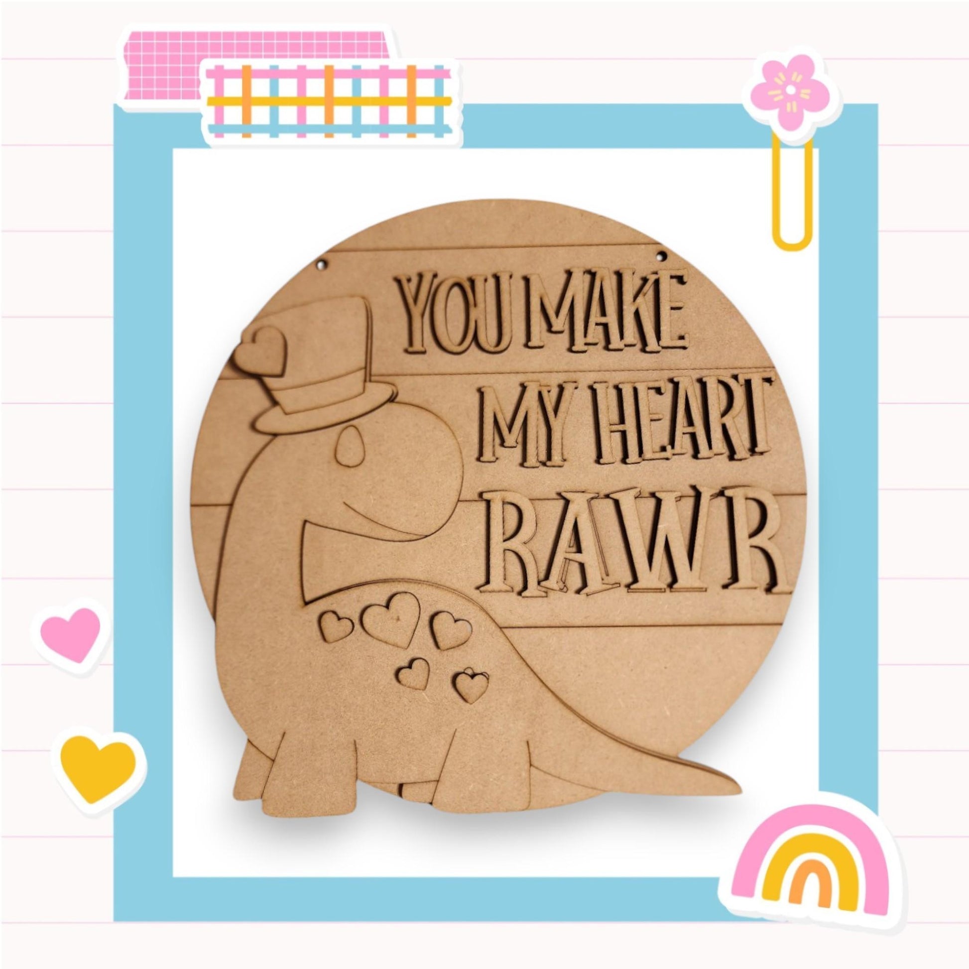 a wooden plaque with a picture of an elephant and the words you make my heart