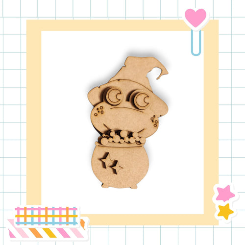 A wooden toy resembling a small, cartoonish creature with a pointed hat and star-shaped cutouts on its body, set against a grid background with various colorful stickers and a heart-shaped object.
