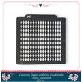 a black stencil with a diamond pattern, placed on a white background.
