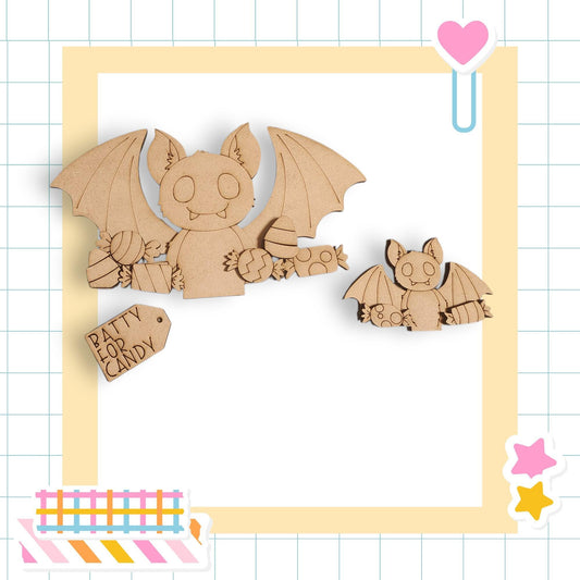 two wooden bats, one larger and one smaller, with wings and a tail, set against a yellow and white checkered background.