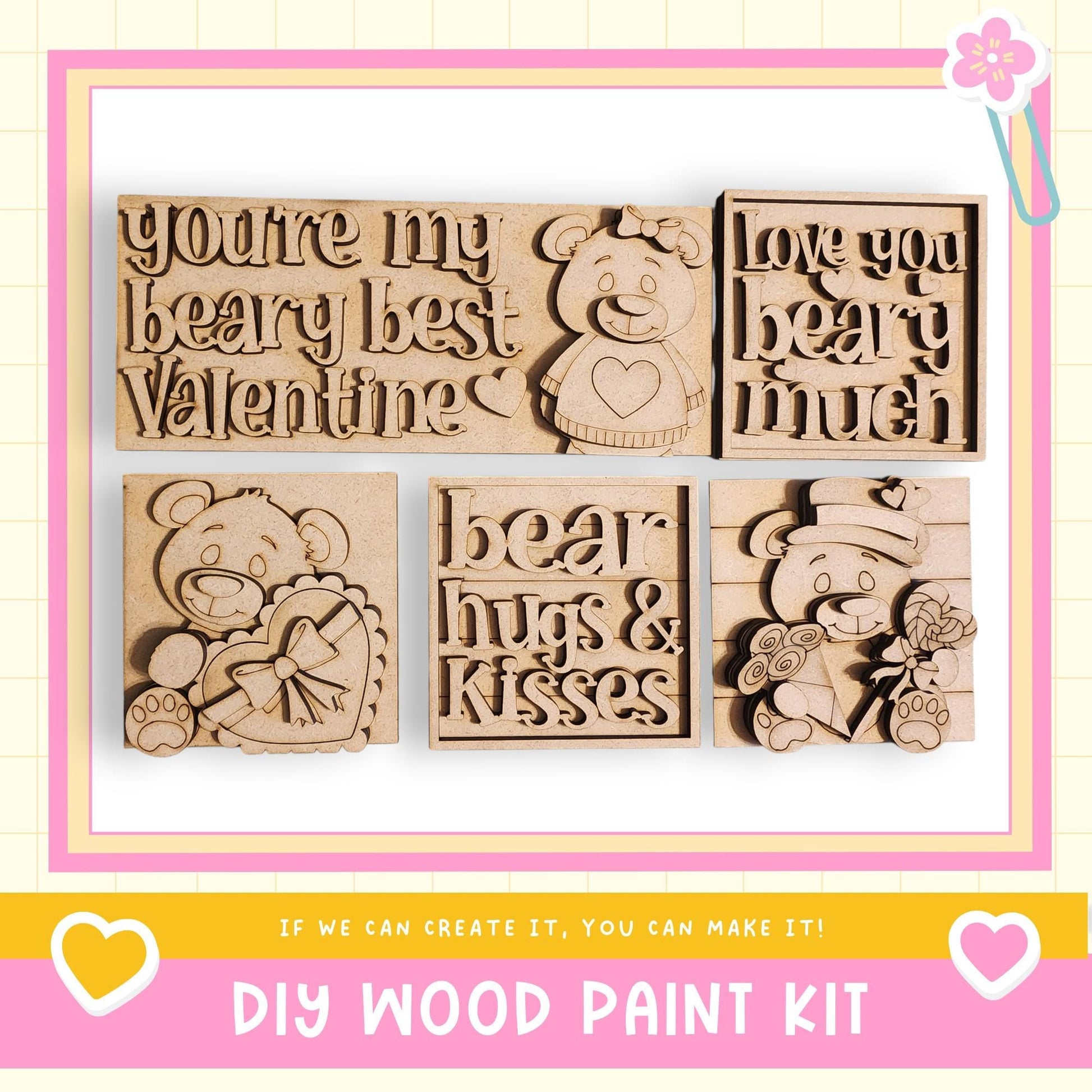 The image is a promotional image for a DIY wood paint kit, featuring various wooden shapes and designs, including a bear and a heart.