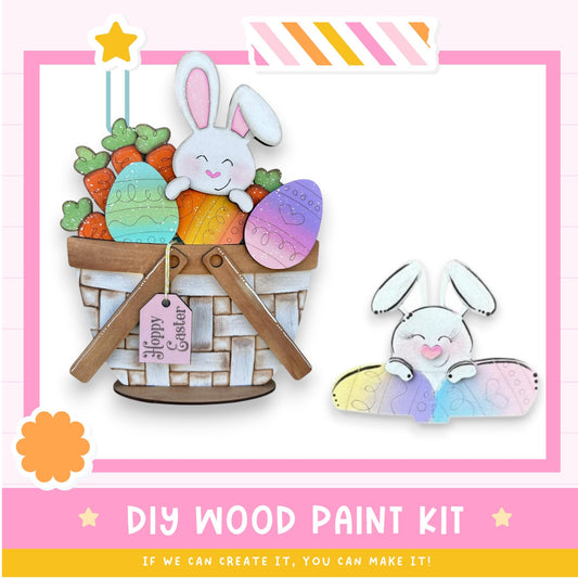 a DIY wood paint kit for creating Easter decorations, including a basket filled with colorful Easter eggs and carrots, and a smaller Easter bunny decoration.
