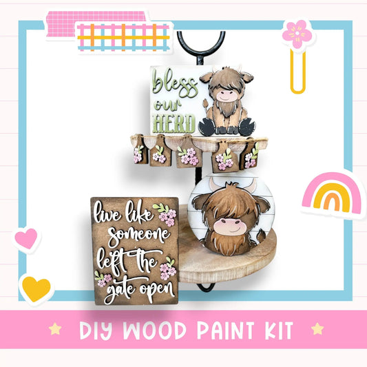 a wooden craft kit with a picture of a sheep and a sign