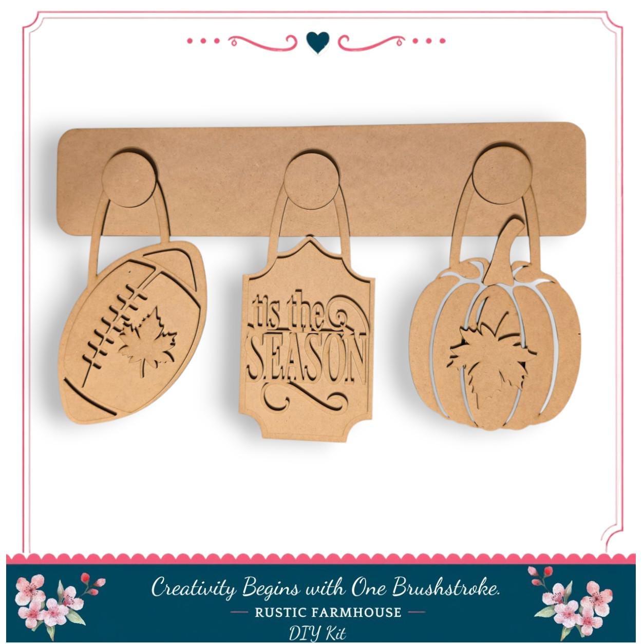 three wooden cutouts hanging on a wooden board, each depicting a different seasonal decoration: a football, a pumpkin, and a maple leaf.