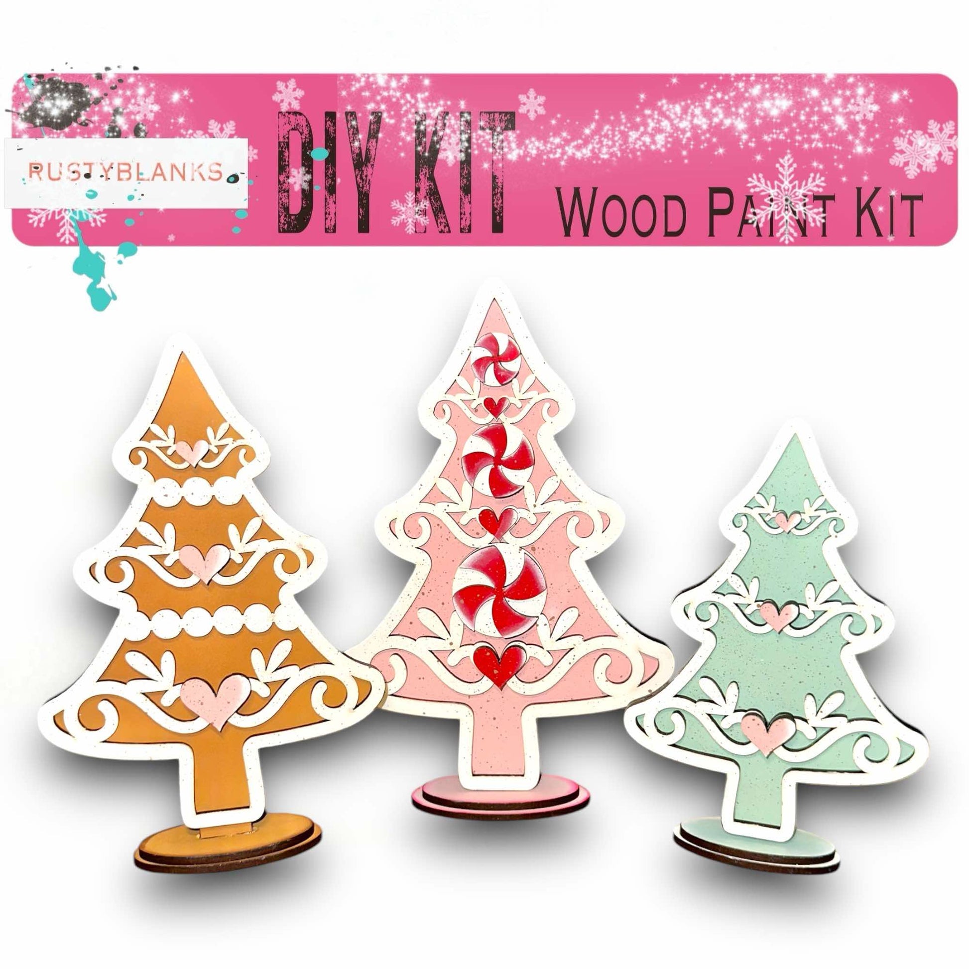 a set of three wooden cut outs of christmas trees