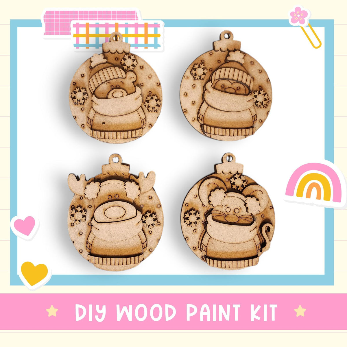 The image is a DIY wood paint kit featuring four wooden ornaments with various designs, including a reindeer, a cat, a snowman, and a rainbow.