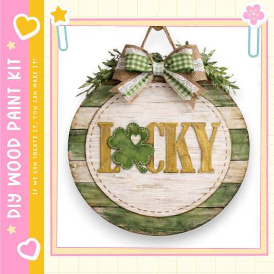A round wooden sign with the word "Lucky" written on it, decorated with a green shamrock and a bow.