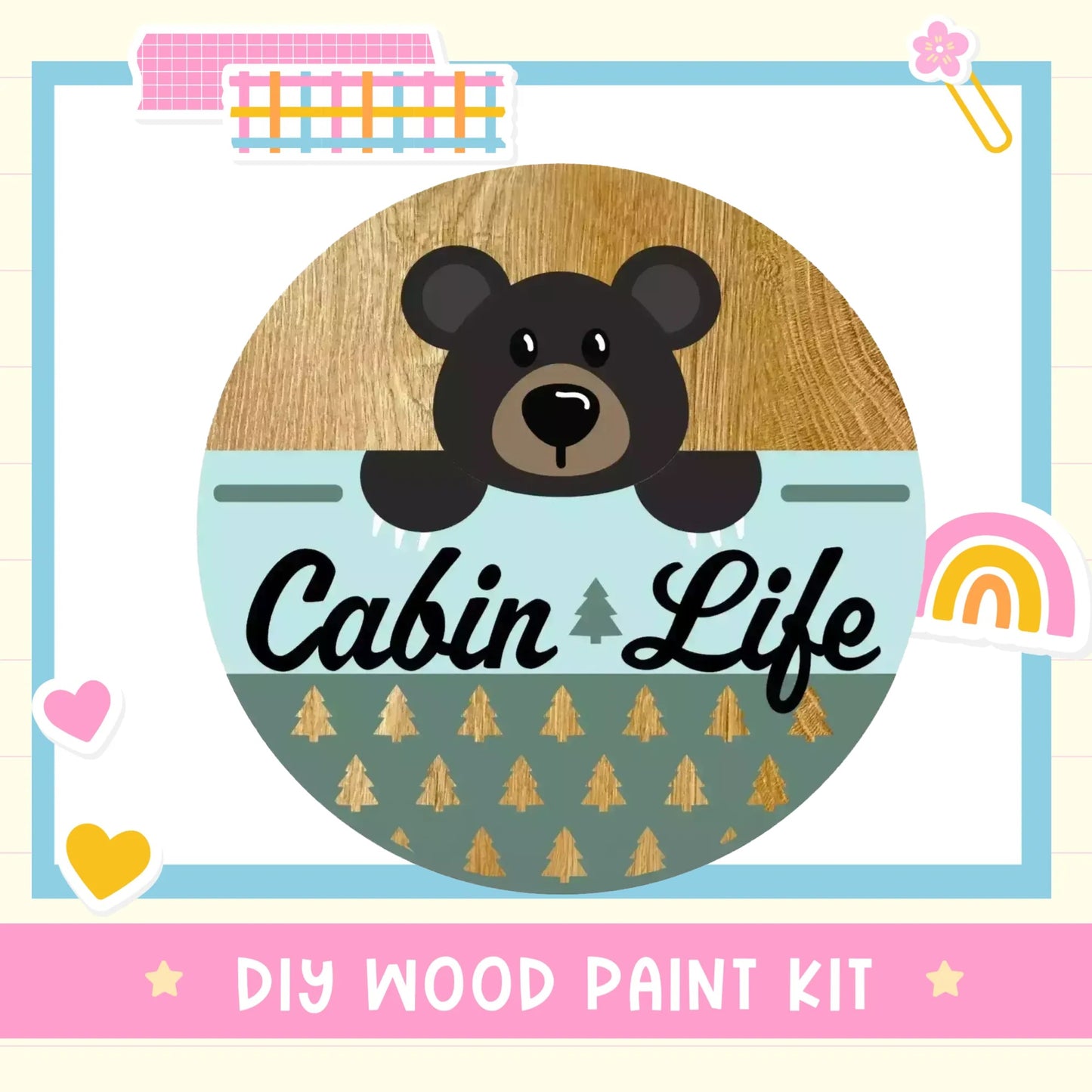 The image is a colorful and whimsical illustration featuring a bear's head peeking out from behind a wooden frame, surrounded by various decorative elements such as hearts, rainbows, and stars.