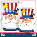 two cartoon-like Santa Claus figures wearing patriotic hats with stars and stripes, and a small bird perched on one of the Santa Claus figures.