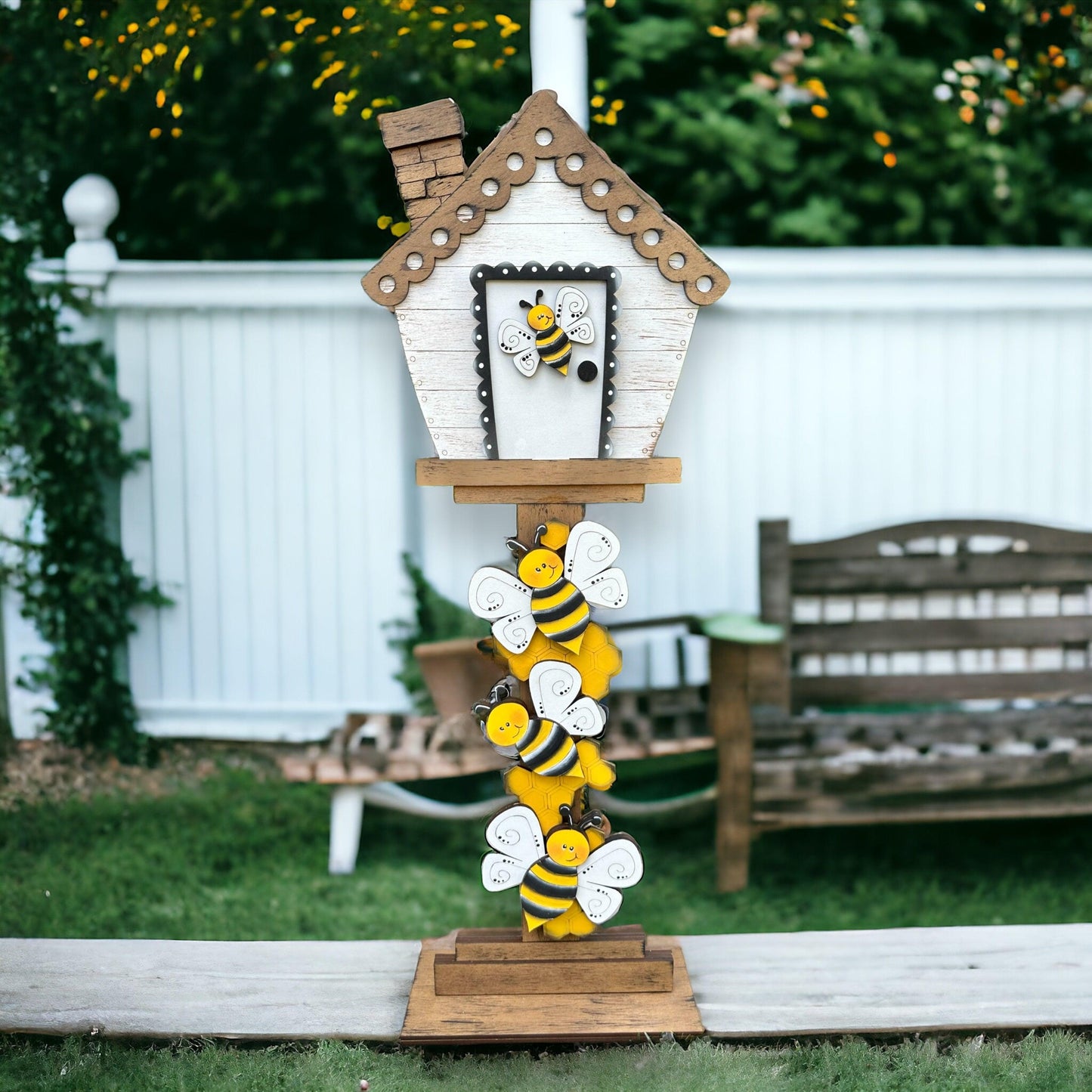 a beehive with a house on top of it