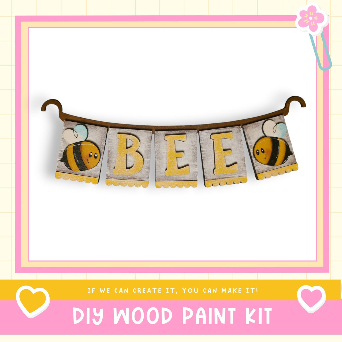 A DIY wood paint kit featuring a banner with the word "BEE" and illustrations of bees.
