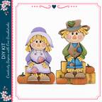 two wooden scarecrow figures, one with a purple dress and the other with a green plaid shirt and hat, sitting on a pile of hay and orange pumpkins.