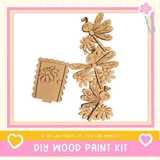The image is a DIY wood paint kit featuring a wooden door and various wooden insects, such as dragonflies and bees, as well as a wooden flower. The kit appears to be made of wood and is designed for creating wooden decorations or art pieces.