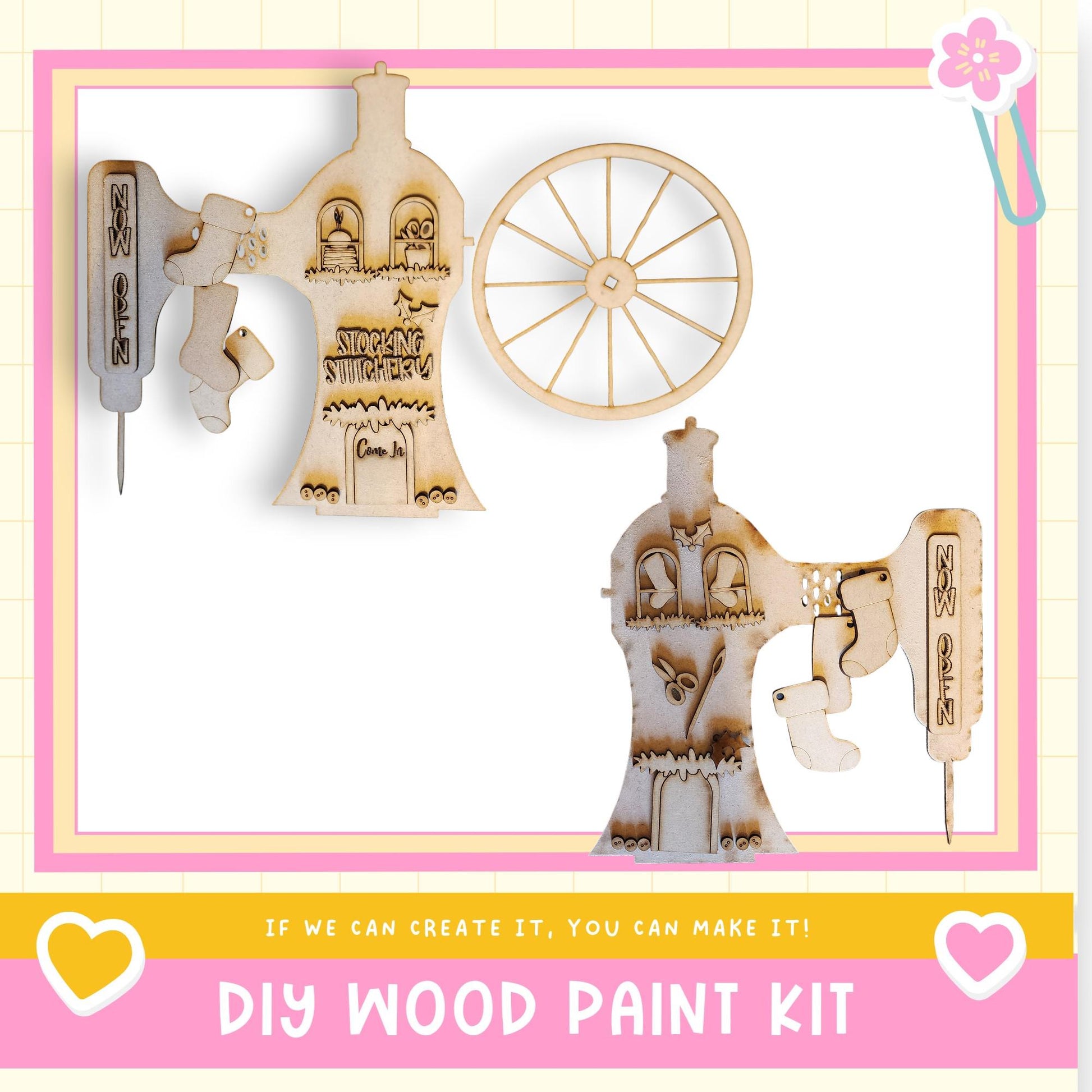 The image is a DIY wood paint kit advertisement, featuring a wooden toy house and a wooden wheel. The text on the image encourages viewers to "If we can create it, you can make it!" and provides a "DIY WOOD PAINT KIT" with a heart symbol and a flower.