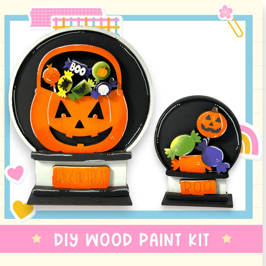 a Halloween-themed DIY wood paint kit, including a carved pumpkin and a carved pumpkin with a carved face. The kit is designed for painting and decorating wooden objects with Halloween motifs.