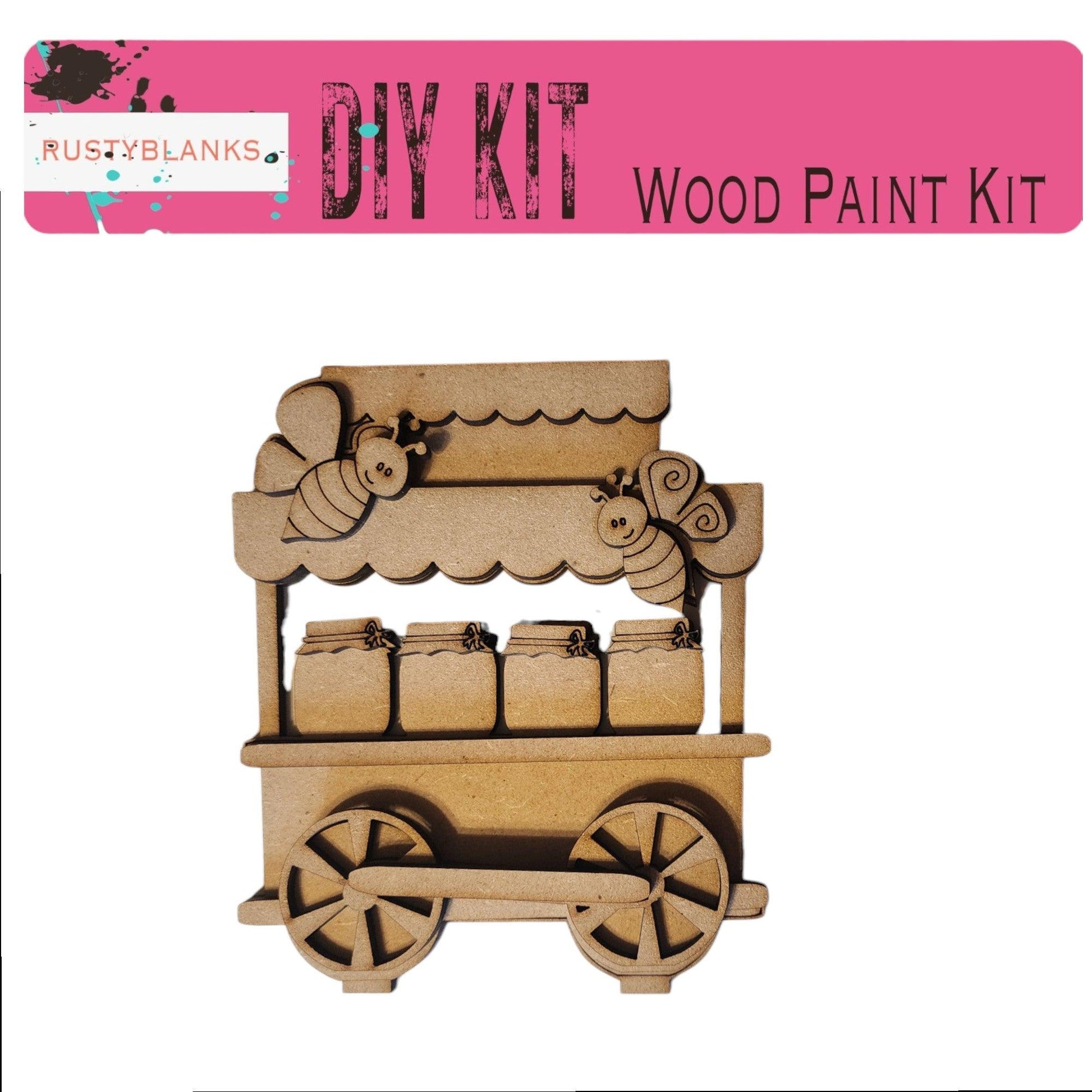 a wooden craft kit of a wagon with bees